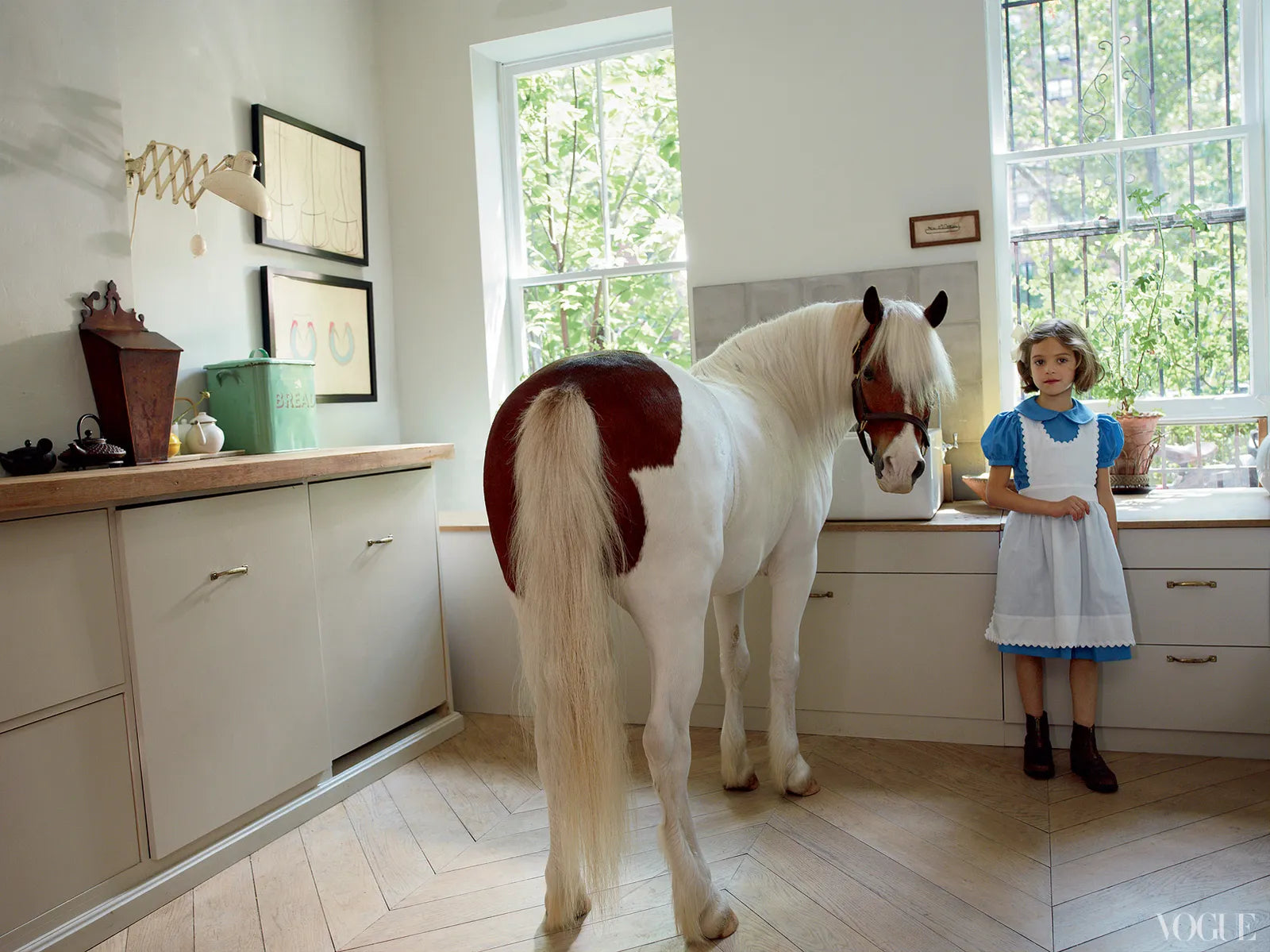 A pony in Amanda Brook's kitchen, Vogue 2013.