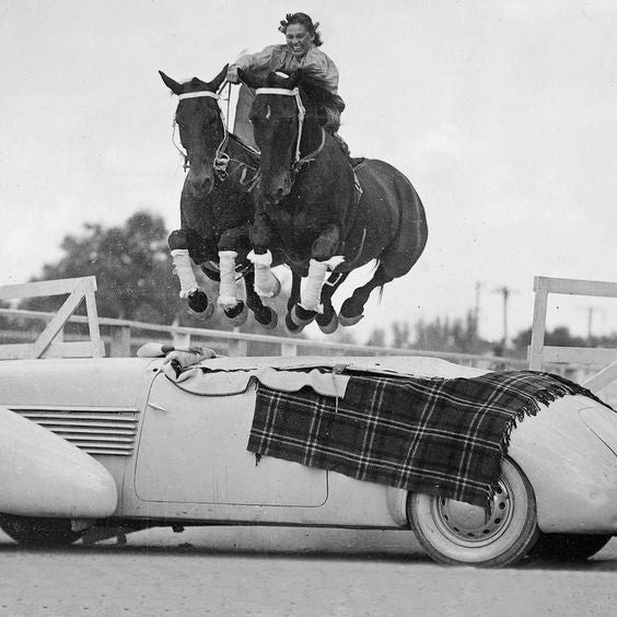 The Roman Standard Jump Trick performed by Alice Sisty, Salt Lake City rodeo arena, 1938.